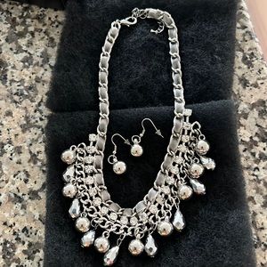 Silver necklace with matching earrings